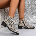 Leopard Block Heel ankle boots in beige suede with black leopard spots, black rubber mid block heels and side zippers