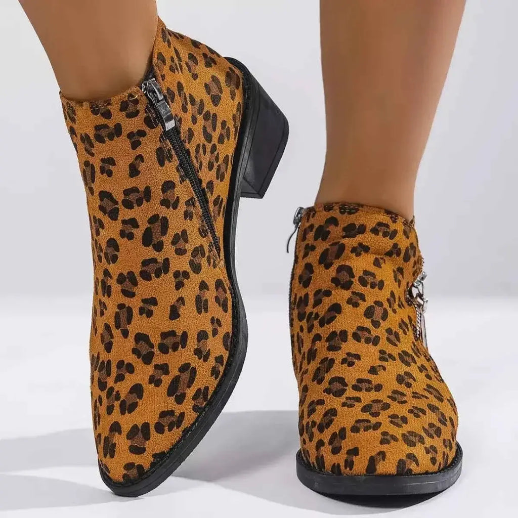 Leopard Block Heel ankle boots in brown suede with black leopard spots and black mid block heels featuring side zippers