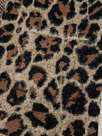 Leopard Open Casual Cardigan featuring a fuzzy beige fabric with black and brown leopard print pattern and a pocket detail
