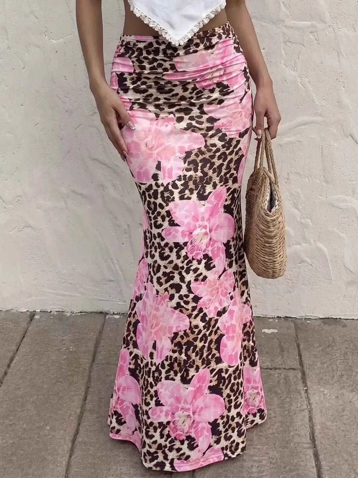 Leopard Print Bodycon maxi skirt with brown and black leopard spots and large pink floral pattern, fitted silhouette