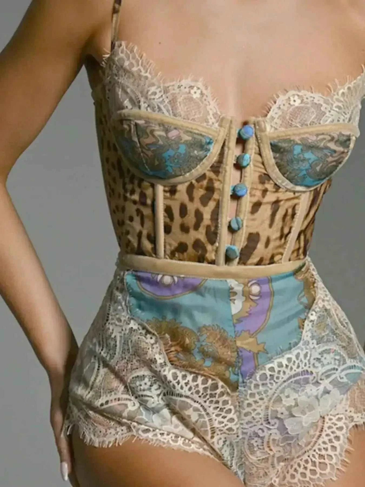 Leopard Print Lace corset-style top with button front and floral lace shorts in pastel blue and beige tones