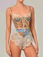Leopard Print Lace trim romper in beige with blue buttons, lace detailing, and mixed animal and floral patterns