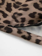 Leopard Print Maxi Skirt in brown and black polyester fabric with a visible black zipper detail