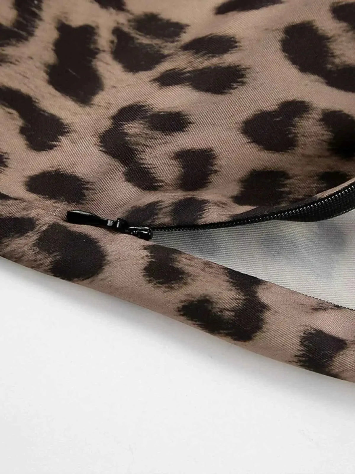Leopard Print Maxi Skirt in brown and black polyester fabric with a visible black zipper detail