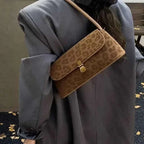 Leopard Print Shoulder Bag in small size with brown suede material and subtle leopard pattern, gold clasp closure