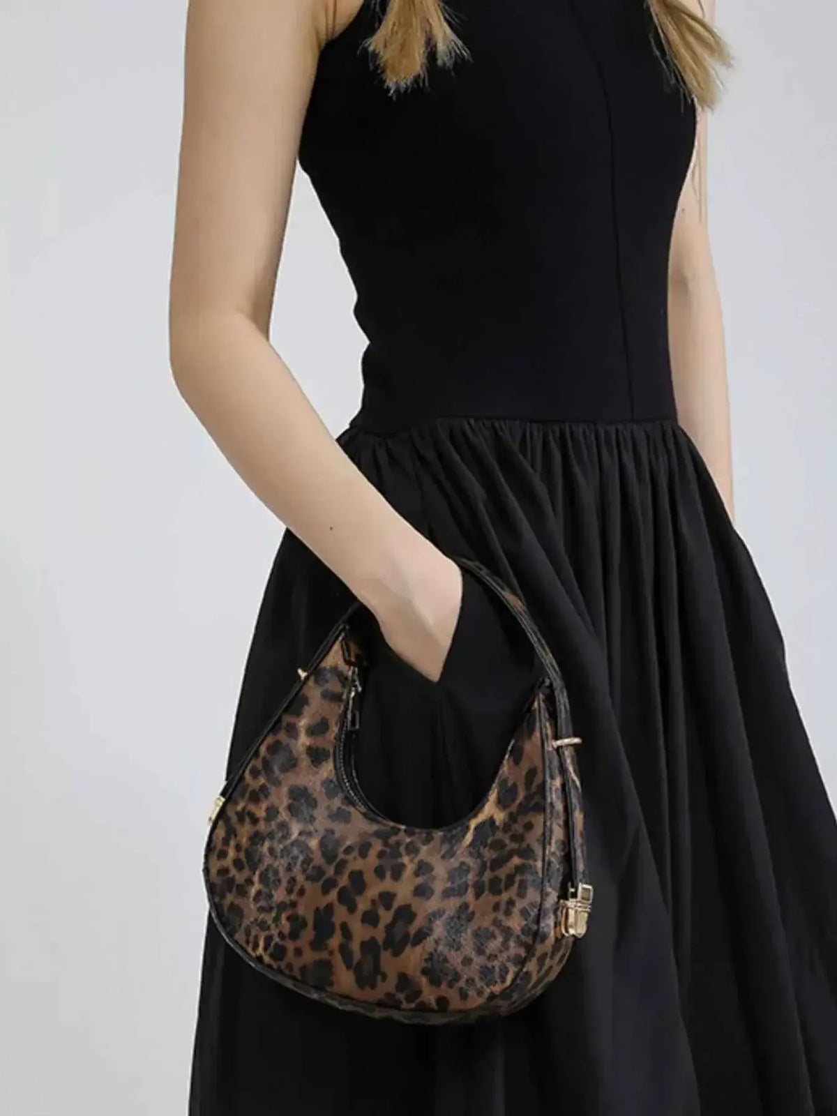 Leopard Print Shoulder Bag in mini size with brown and black spotted PU leather and gold hardware accents
