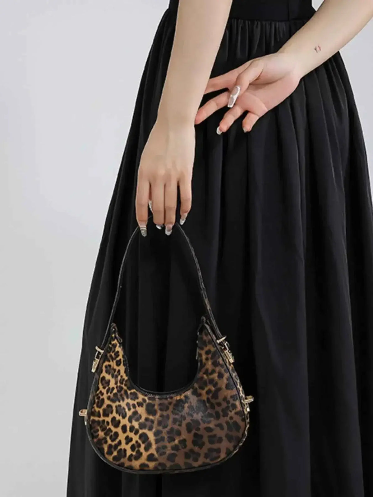 Leopard Print Shoulder Bag in mini size with brown and black spotted PU leather and a short strap