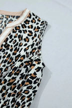 Leopard Print sleeveless midi dress with beige colorblock trim and tiered polyester fabric