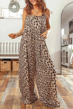 Leopard Print sleeveless jumpsuit with square neck, pleated wide legs, and side pockets in brown and black tones