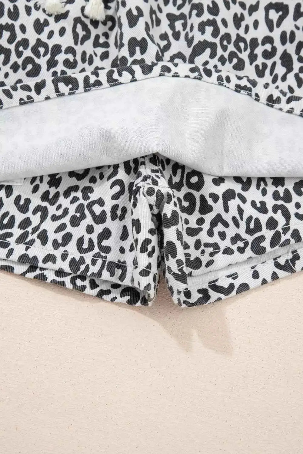 Leopard Print Tassel drawstring casual denim skort with black and white leopard spots and a white inner lining