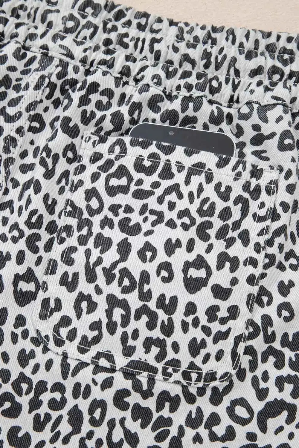 Leopard Print Tassel casual denim skort pocket detail with black and white leopard pattern and elastic waist