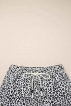 Leopard Print Tassel drawstring casual denim skort in black and white with pocketed sides and a front tie