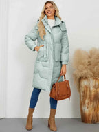 Long Sleeve Longline Hooded Winter Coat in light mint green polyester with stitched pattern, side pockets, and long length