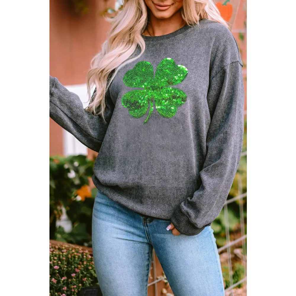 Elevate your wardrobe with the lucky clover luxury fashion sweatshirt $45.99 sparkling sequin embellishments