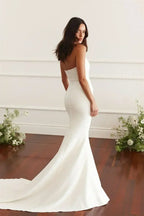 Maternity Mermaid Wedding Dress in elegant white silk satin, strapless with fitted mermaid silhouette and a sweep train