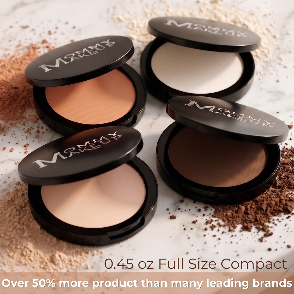 Mineral Dual Powder Foundation compacts in medium and dark shades with black cases and loose powder scattered around