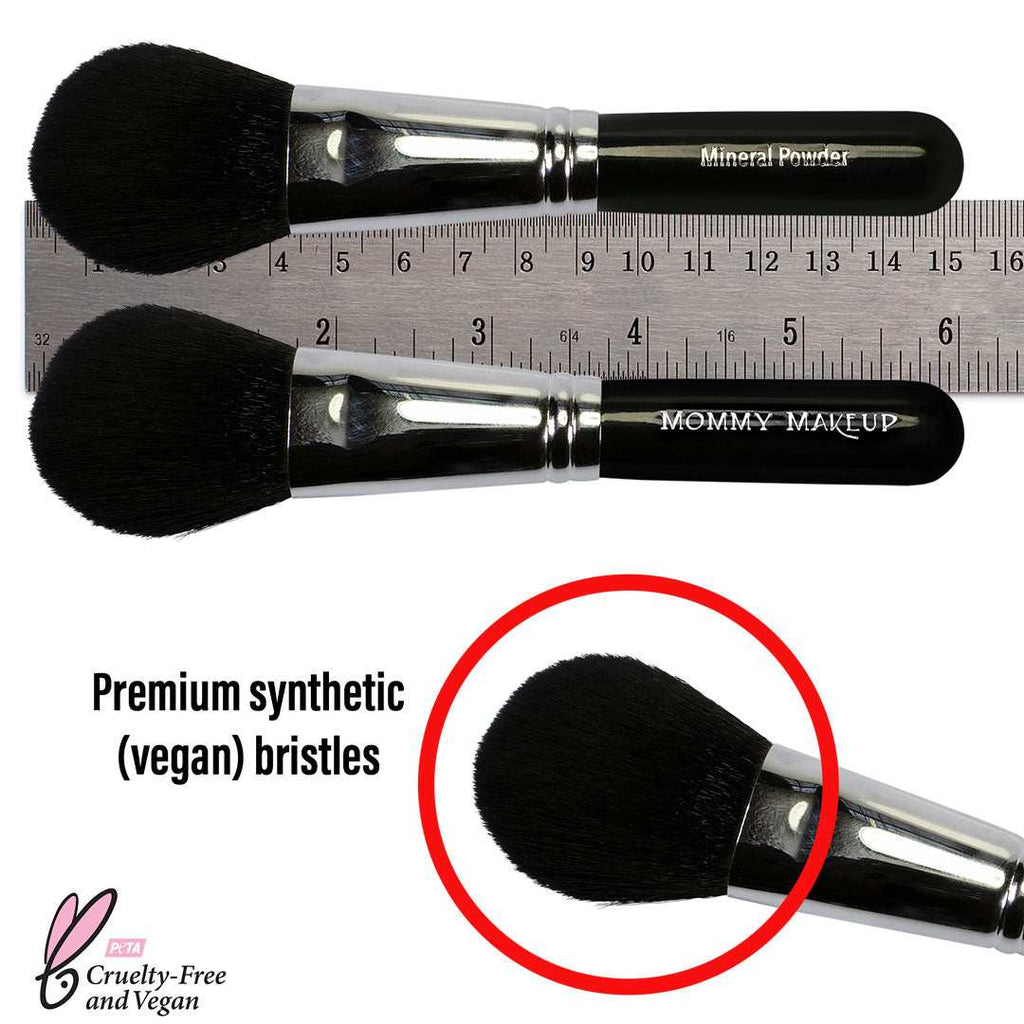 Mineral Powder Brush with black vegan synthetic bristles, full fluffy dome head, and black handle for smooth blending