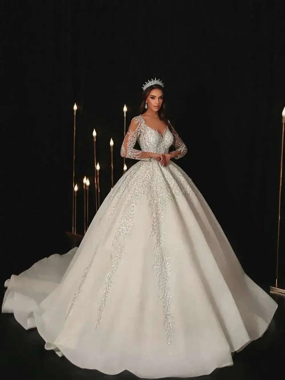 Modern Wedding Dresses white A-line bridal gown with lace appliques, full sheer sleeves, V-neckline, and floor-length sweep train
