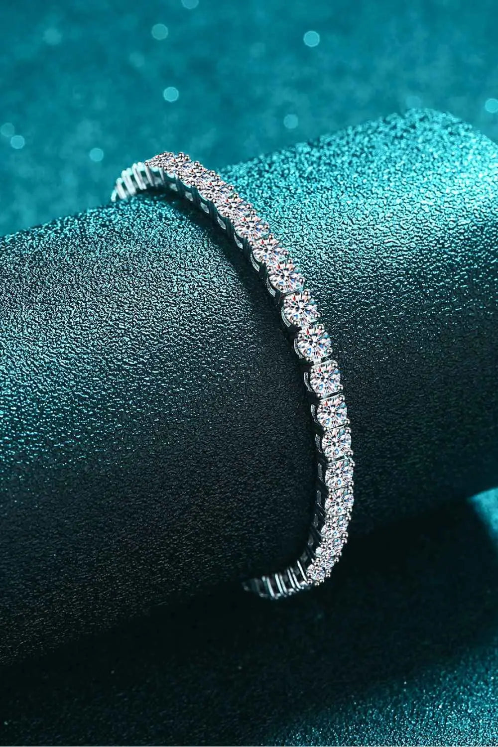 Moissanite Bracelet in polished 925 sterling silver with sparkling round moissanite stones in a minimalist design