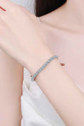 Moissanite Bracelet in polished silver with minimalist design featuring numerous small sparkling stones on a slender band