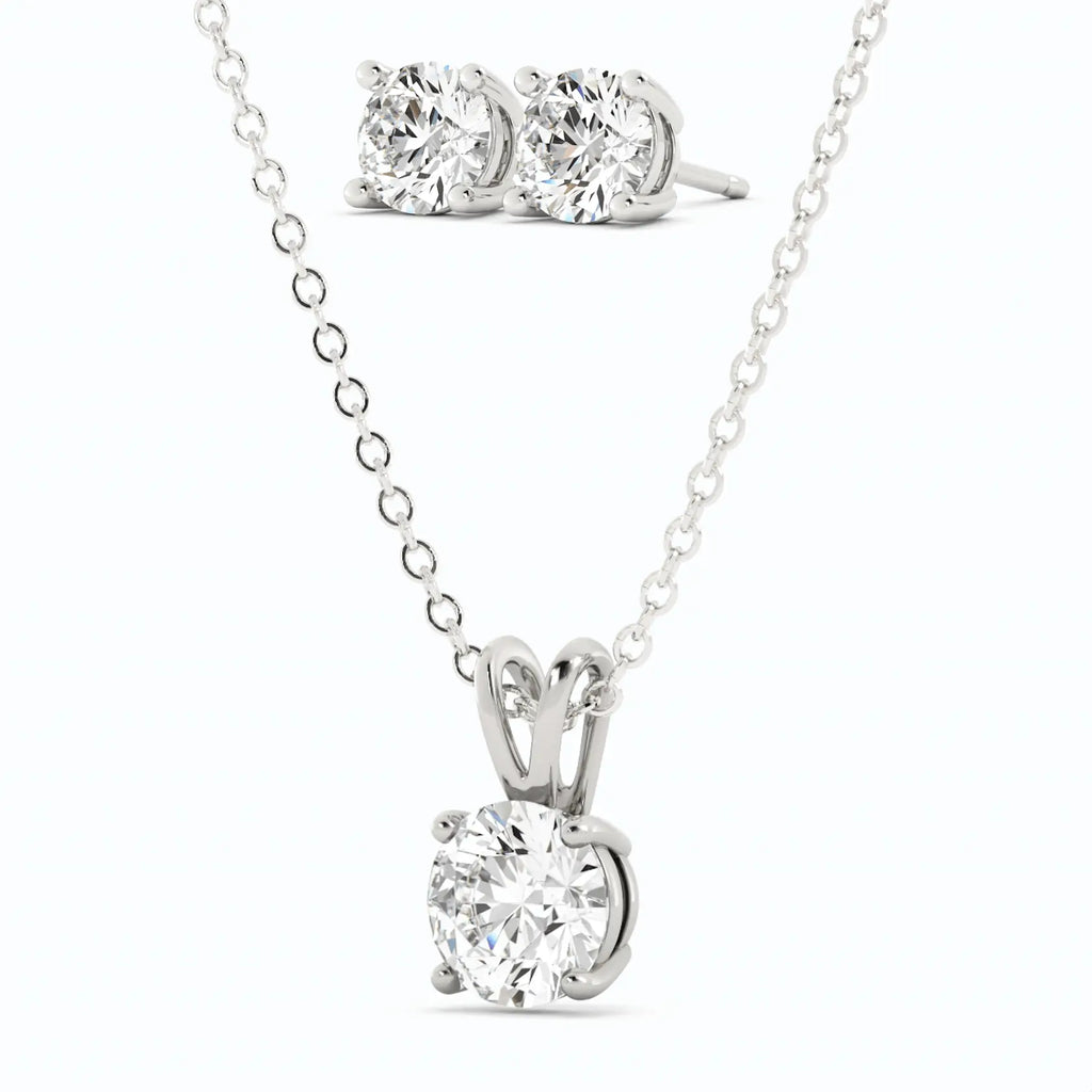 Moissanite stud earrings and pendant necklace set in 14K white gold overlay with round-cut sparkling stones
