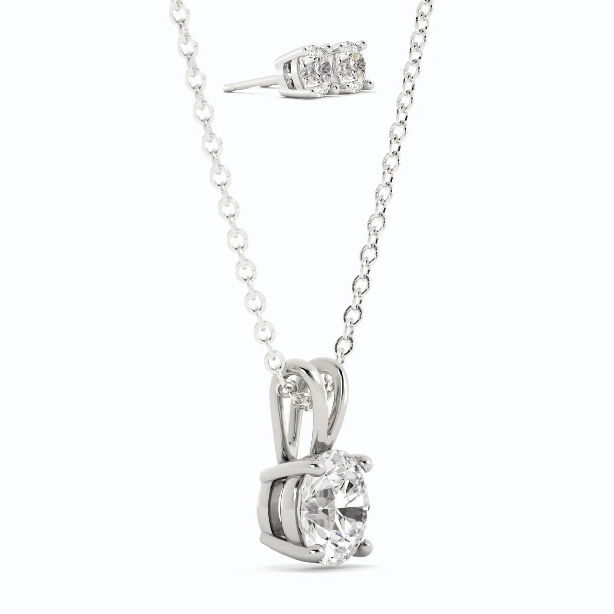 Moissanite Stud Earrings and pendant necklace set in 14K white gold plated sterling silver with round-cut stones