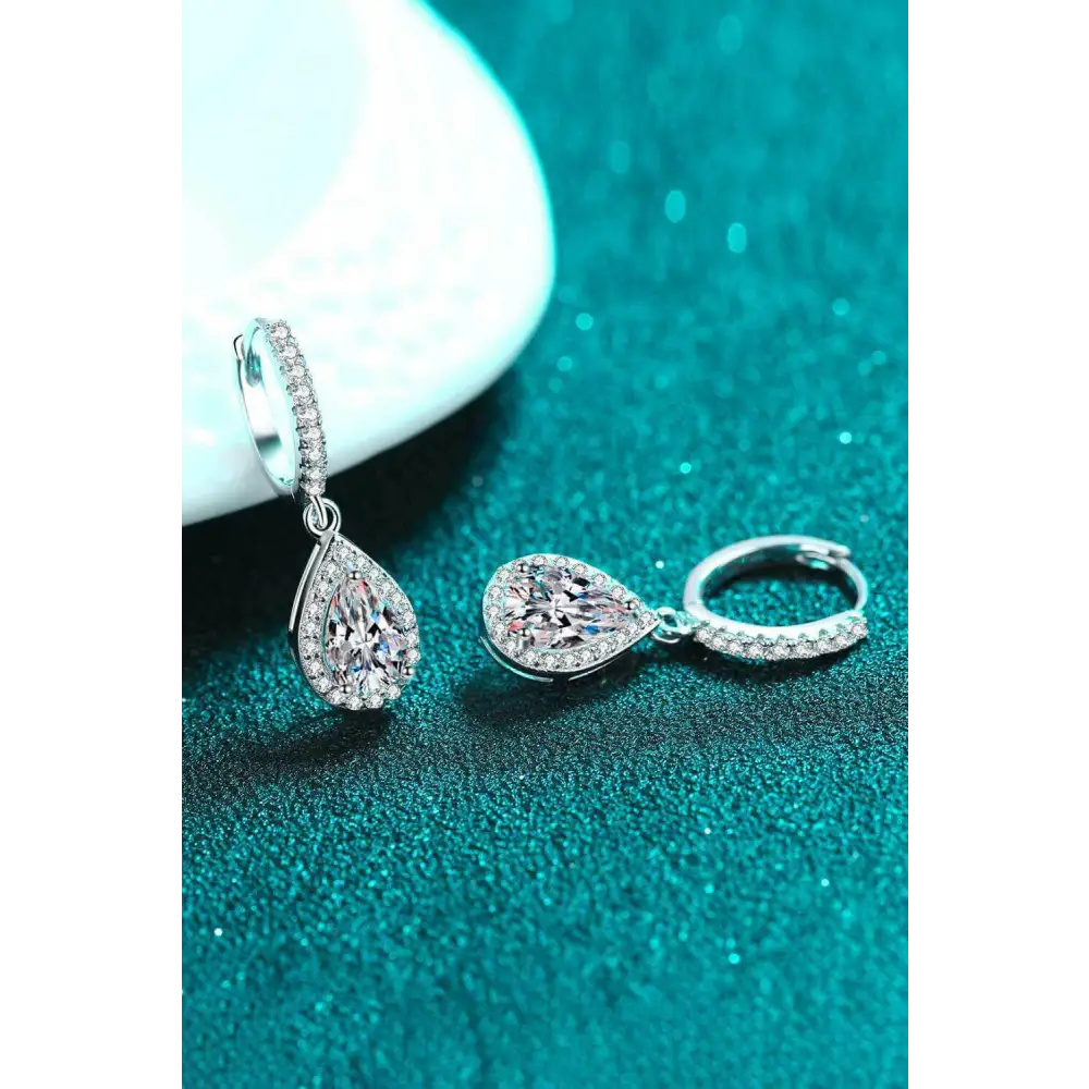 Exquisite moissanite teardrop earrings in rhodium-plated silver $185 indulge in the elegance of moissanite jewelry,