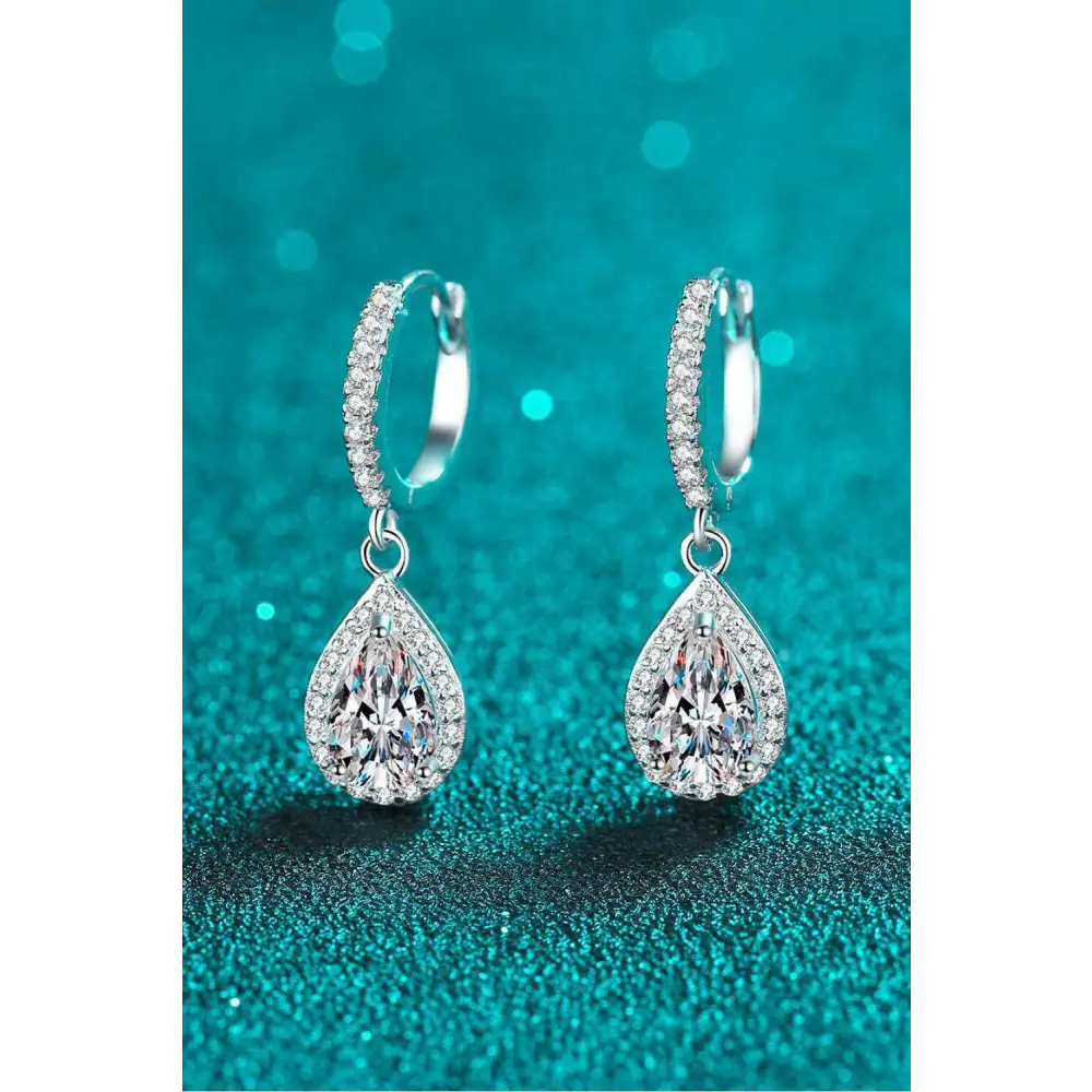 Exquisite moissanite teardrop earrings in rhodium-plated silver $185 indulge in the elegance of moissanite jewelry,