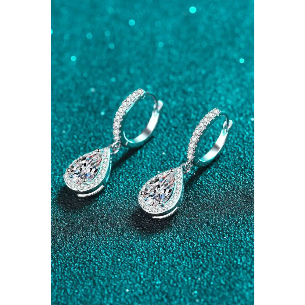 Exquisite moissanite teardrop earrings in rhodium-plated silver $185 indulge in the elegance of moissanite jewelry,