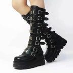 Black knee-high Multi-Buckle Platform Boots made of PU leather with chunky rubber soles and multiple silver buckles.