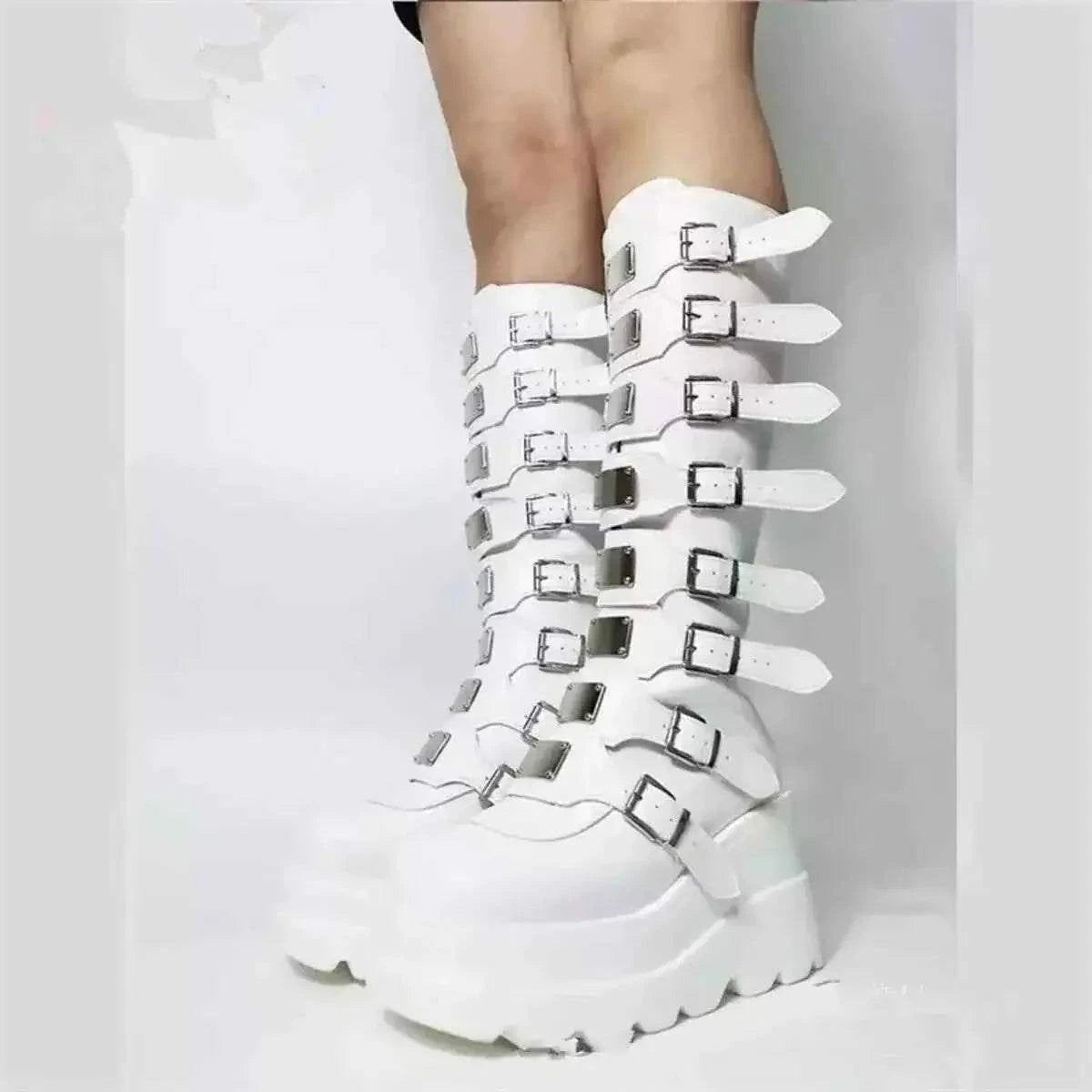 Multi-Buckle Platform Boots in white PU leather with high chunky platform soles and multiple silver buckles up the knee-high shaft