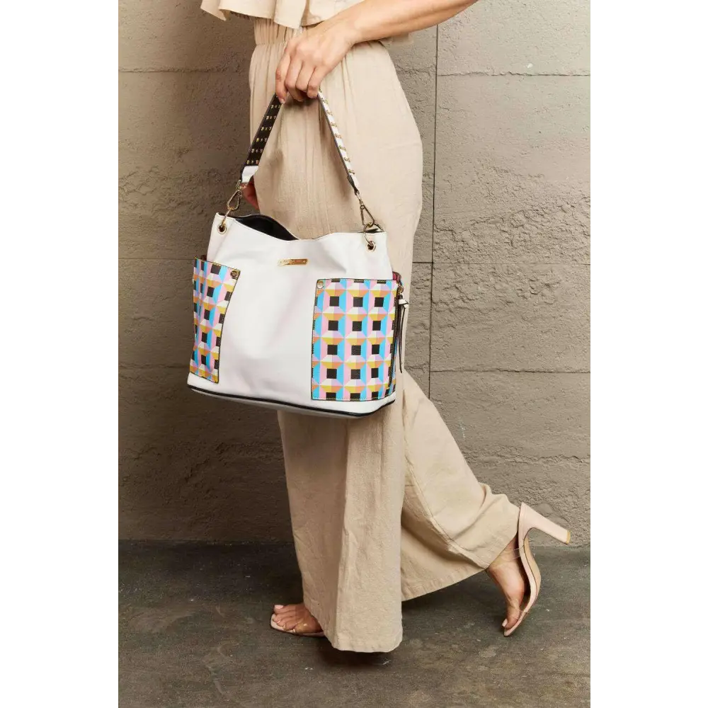 Elevate your style with the nicole lee quihn luxury handbag set $65 the set includes a large shoulder bag, a solid bag,