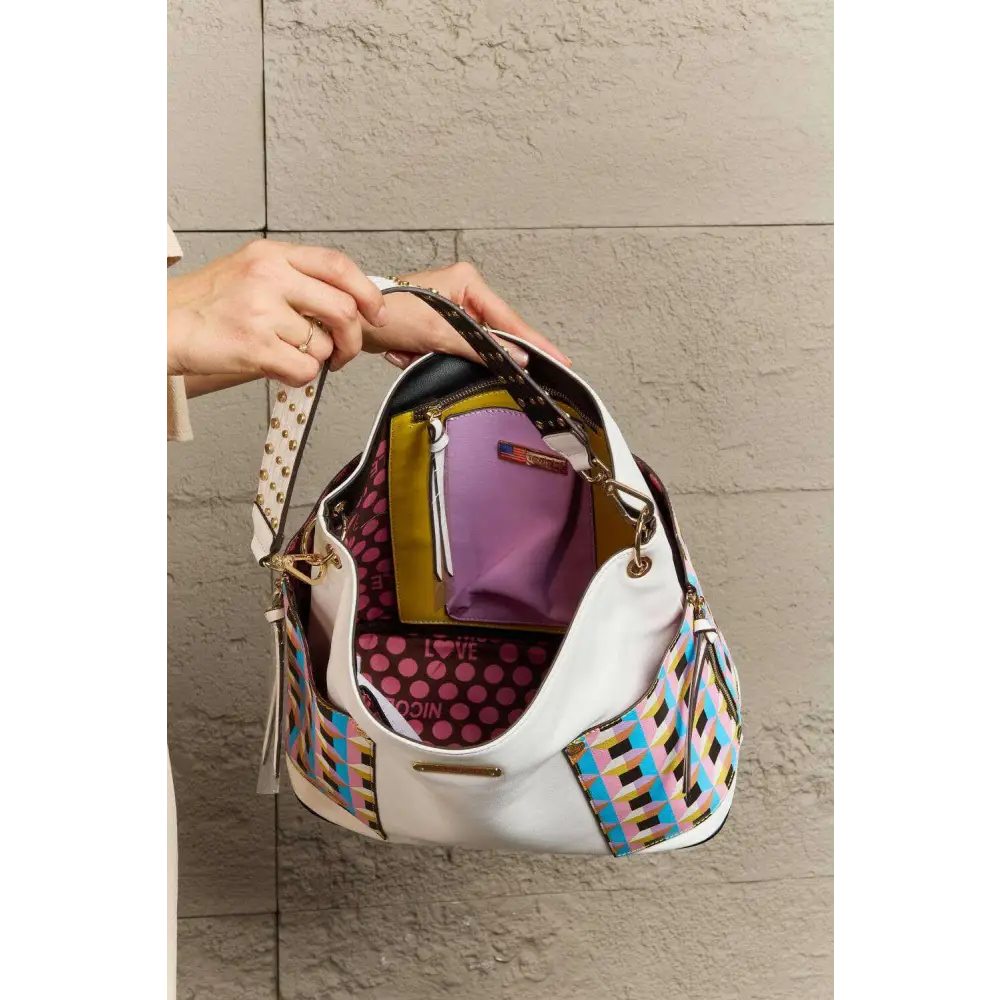 Elevate your style with the nicole lee quihn luxury handbag set $65 the set includes a large shoulder bag, a solid bag,