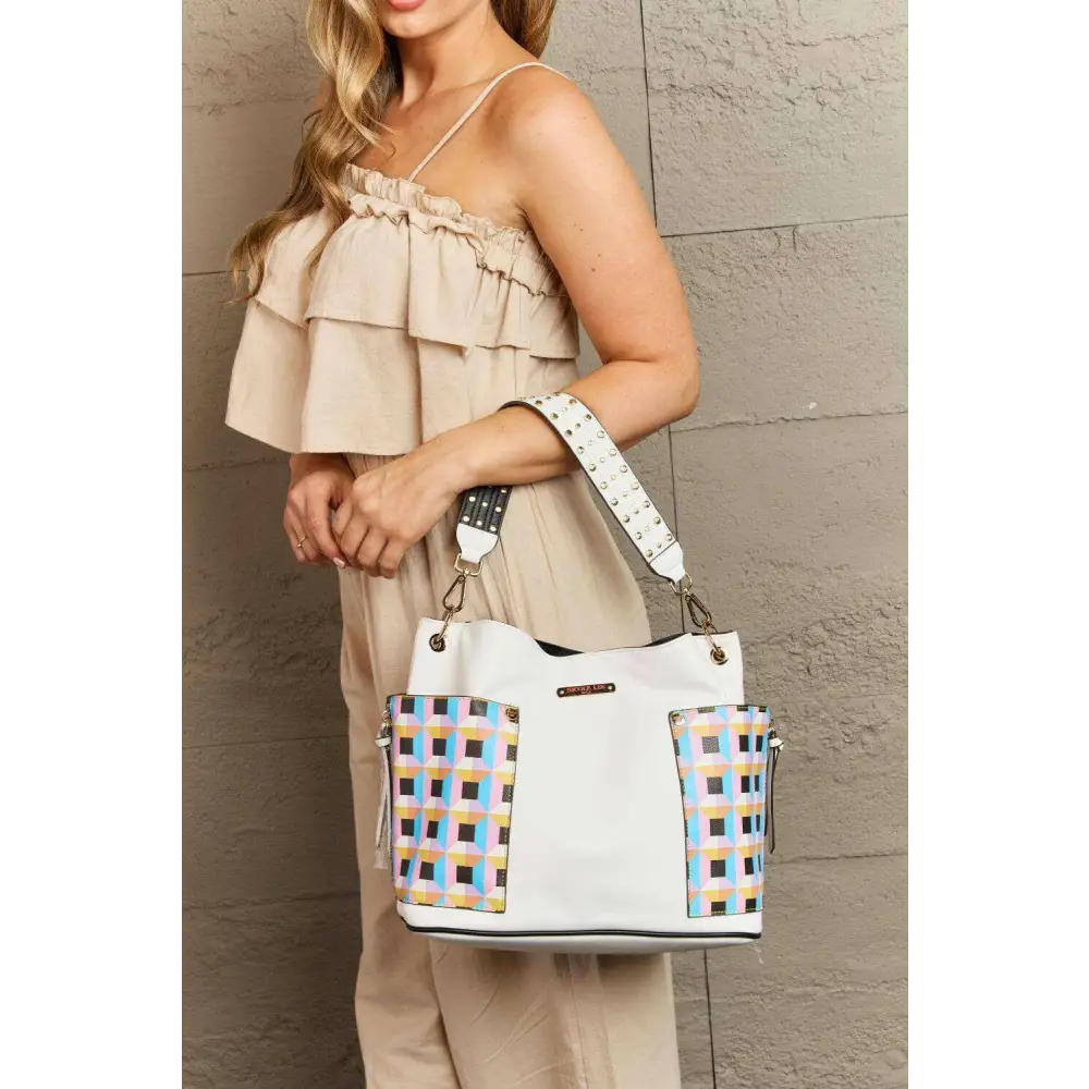 Elevate your style with the nicole lee quihn luxury handbag set $65 the set includes a large shoulder bag, a solid bag,