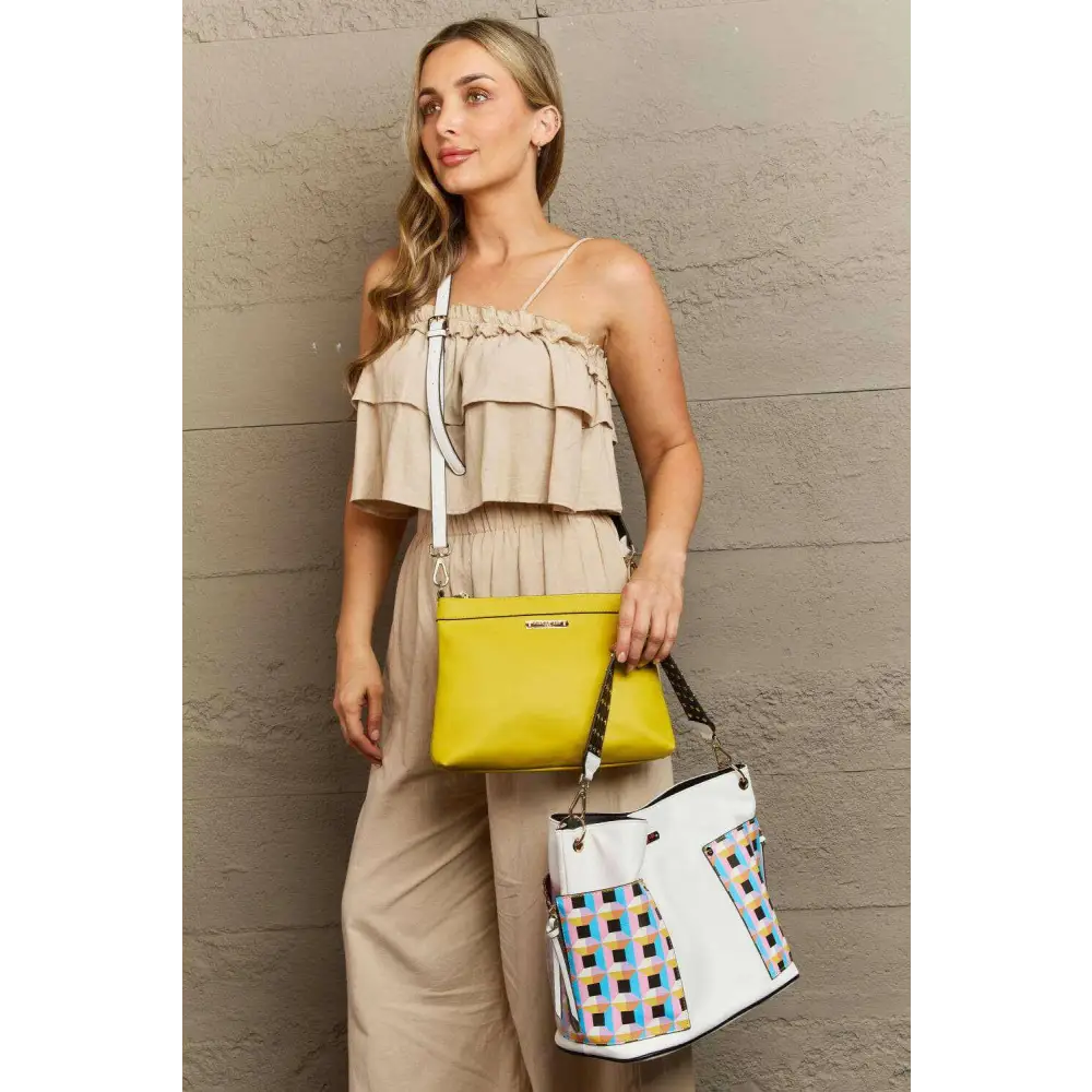 Elevate your style with the nicole lee quihn luxury handbag set $65 the set includes a large shoulder bag, a solid bag,