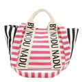 Nicole Lee USA striped canvas tote bag with pink and white front stripes, black and white side stripes, and logo-printed shoulder straps