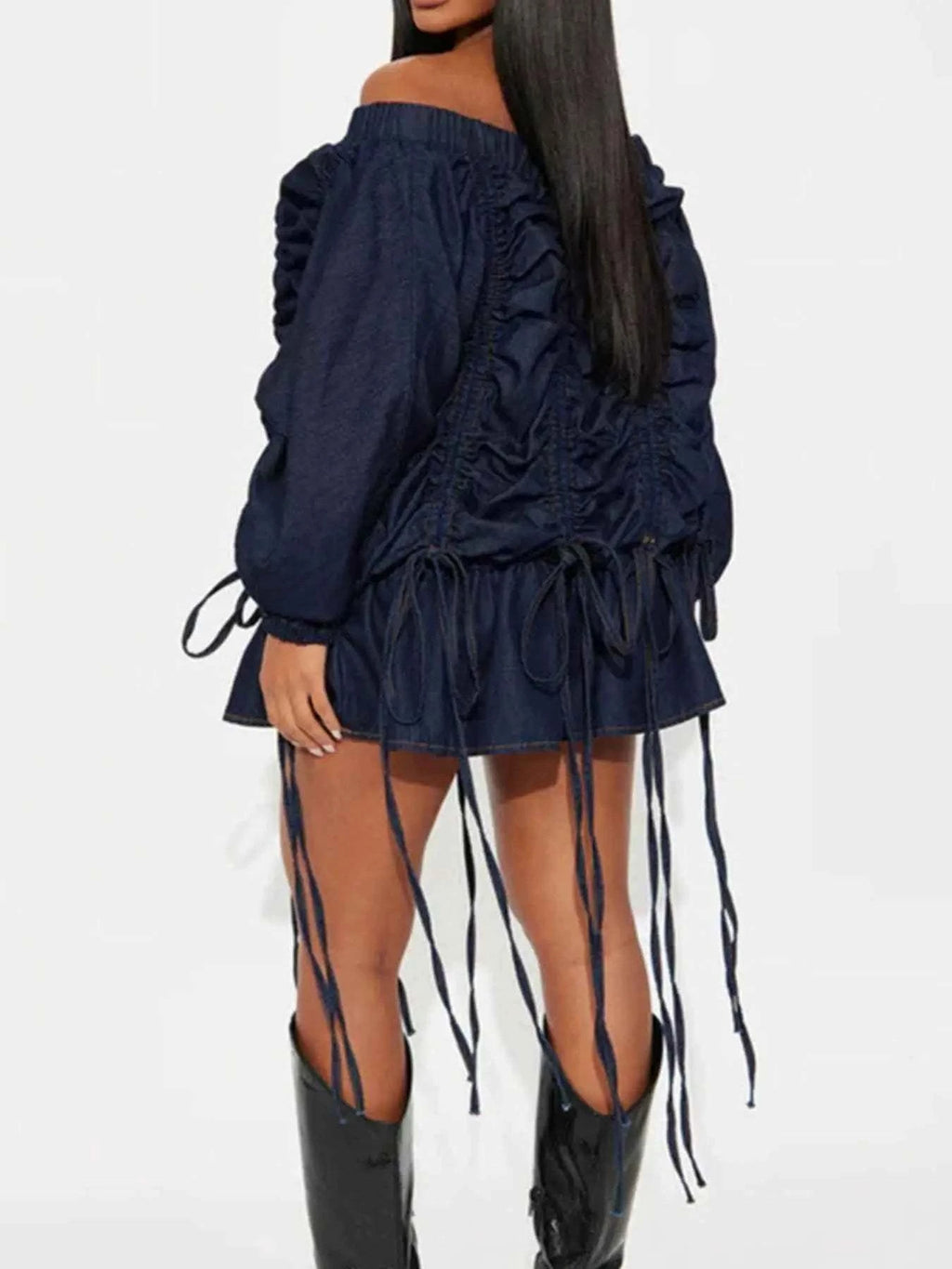 Off-Shoulder Ruched Denim Dress in dark blue with long sleeves, ruching details, drawstrings, and ruffled hem.