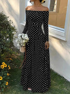 Off-the-Shoulder Maxi Dress in black with white polka dots, long sleeves, and a fitted waist with a flowing skirt