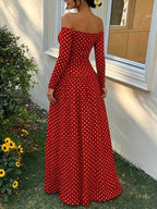 Off-the-Shoulder Maxi Dress in red with white polka dots, long sleeves, and a fitted bodice flowing into a full-length skirt.