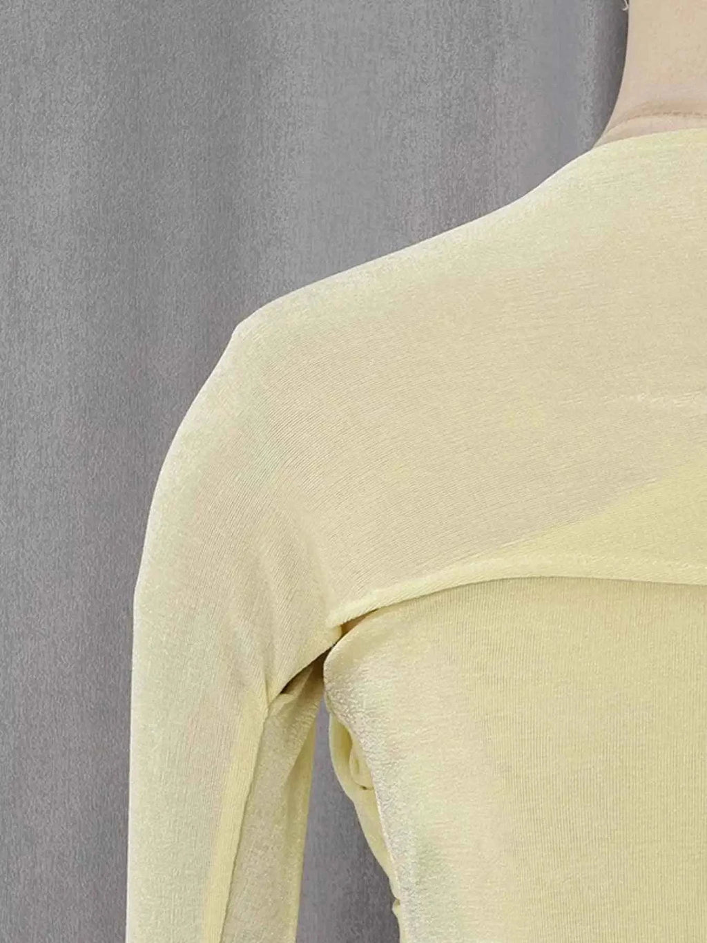 One-Shoulder Draped Maxi Dress in pale yellow with soft ruched fabric and an asymmetric neckline for elegant silhouette enhancement.