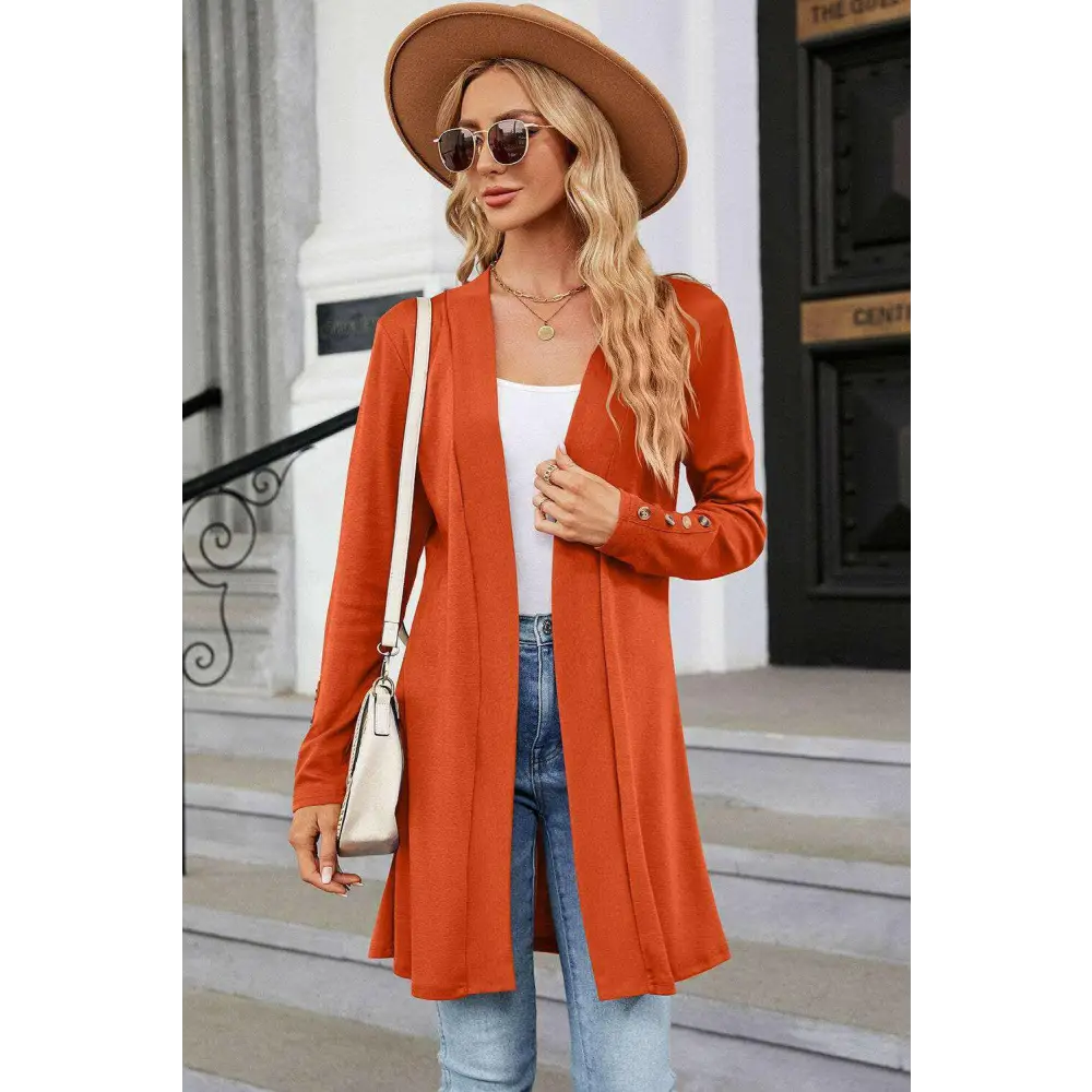 Elevate your wardrobe with the open front long sleeve cardigan $28 this exquisite decorative button adds a unique