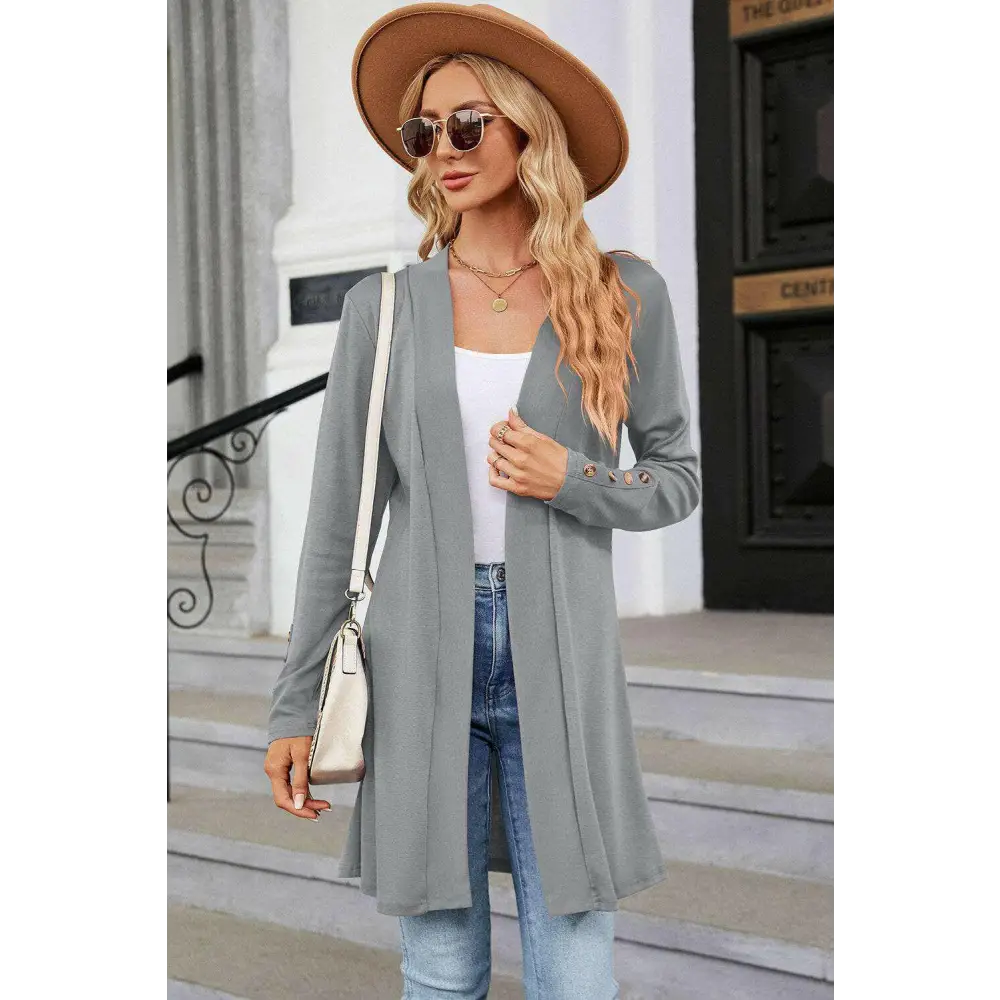 Elevate your wardrobe with the open front long sleeve cardigan $28 this exquisite decorative button adds a unique