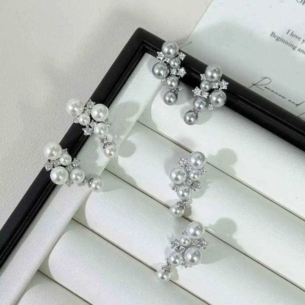 Pearl Cluster Earrings with white synthetic pearls and sparkling zircon stones set in 925 sterling silver in an elegant cluster design