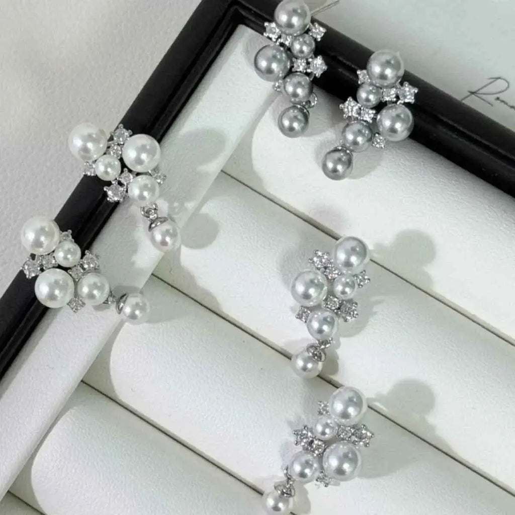 Pearl Cluster Earrings with white and silver synthetic pearls and small zircon stones in a sterling silver setting