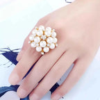 Pearl Cluster Ring featuring white synthetic pearls and rhinestones set on an 18K gold-plated alloy band