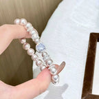 Pearl Zircon Bracelet featuring white synthetic pearls and sparkling zircon stones in a silver-tone alloy setting