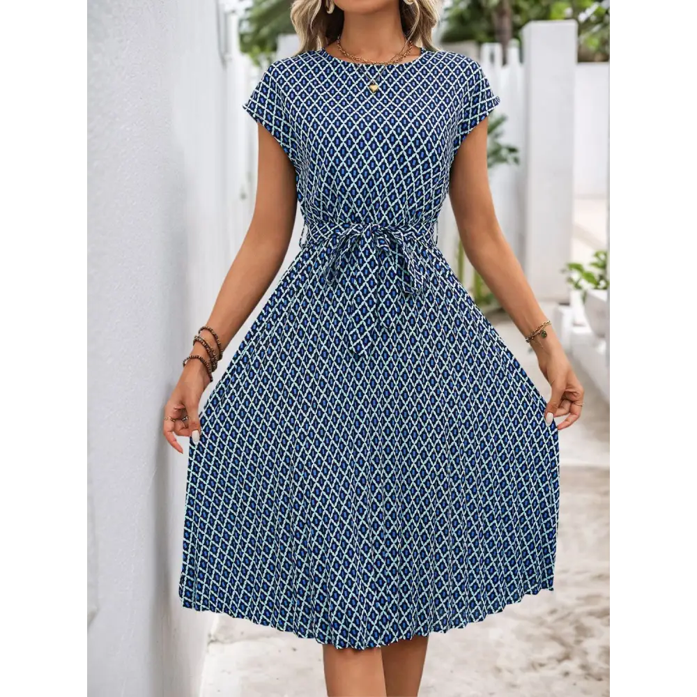 Perfee printed midi dress redefining luxury fashion for women $31.99 tied for a chic finish, buttoned for added