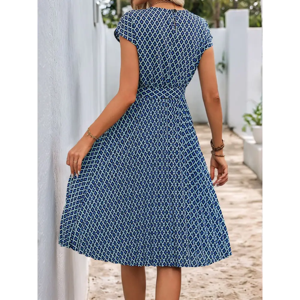 Perfee printed midi dress redefining luxury fashion for women $31.99 tied for a chic finish, buttoned for added