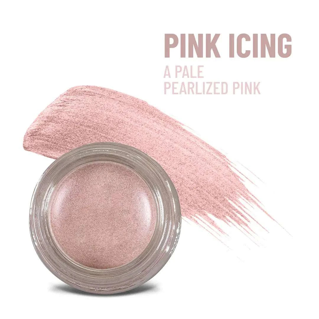 Pink icing waterproof multi-tasking creme in a glass jar with silver lid for eyes cheeks and lip color use