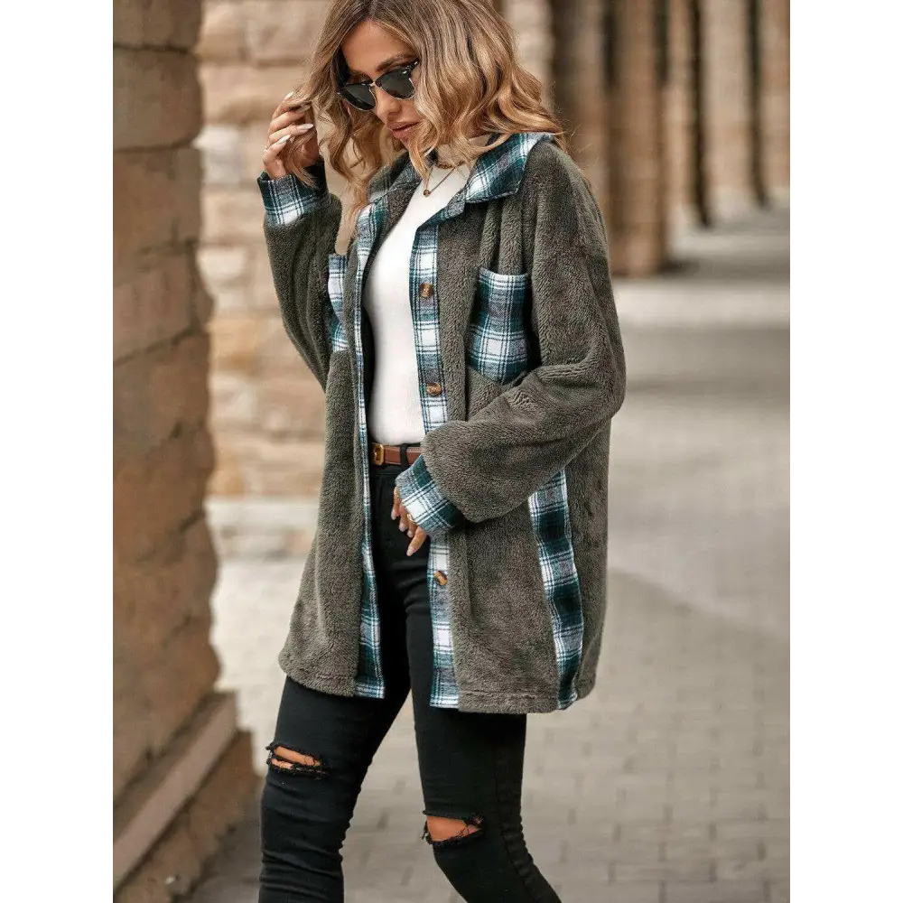 Elevate your wardrobe with the plaid contrast dropped shoulder coat $35 pocketed, a design element that brings both